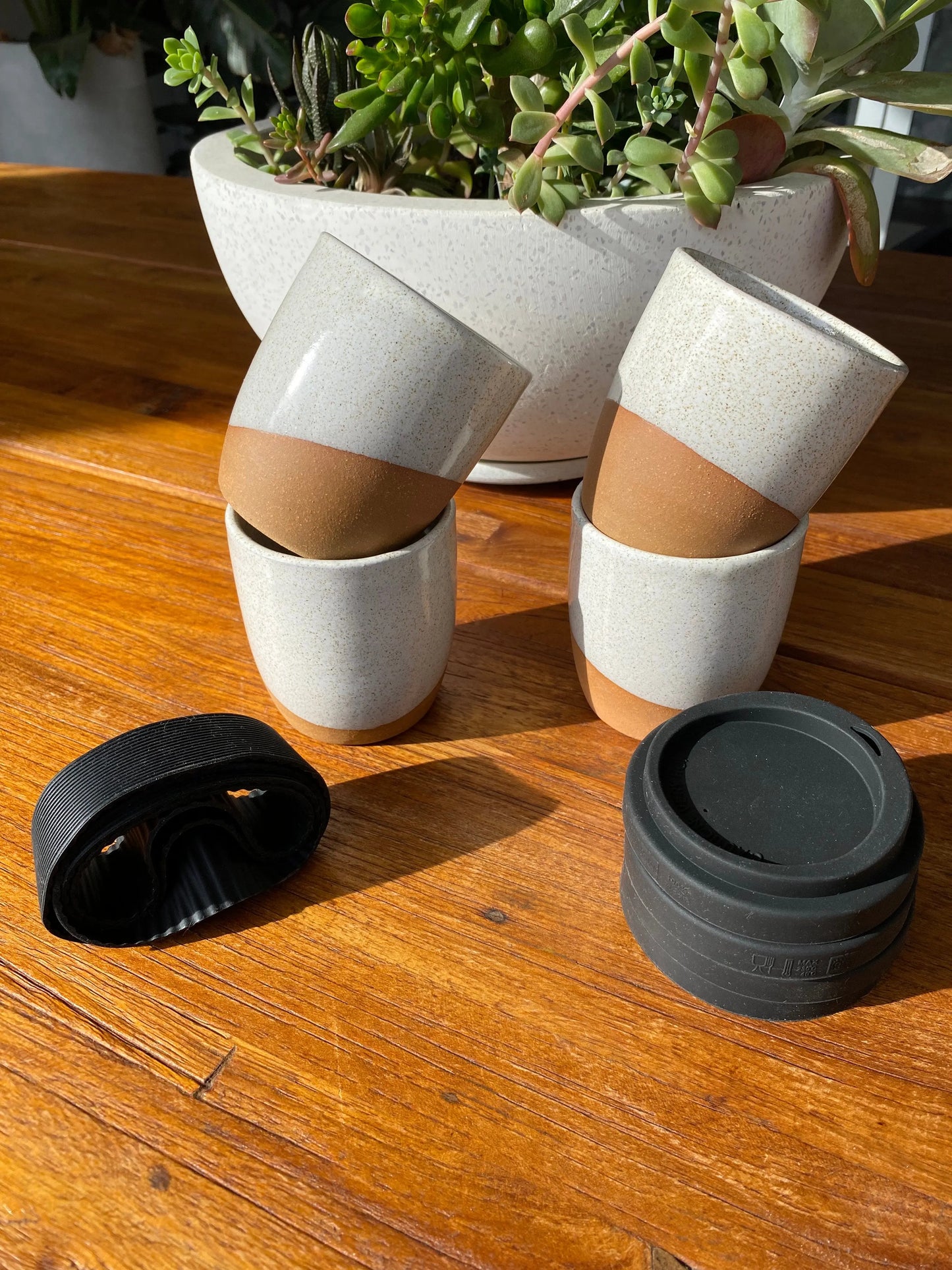 Hand Thrown Light Brown And White Glaze Travel Mud with Black Silicone Lid Bruce Wood Ceramics